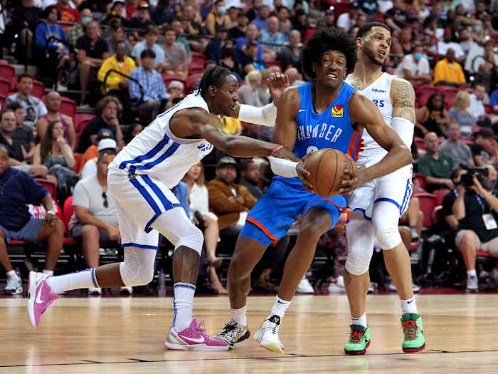 Golden State Warriors forward Jonathan Kuminga wears the Nike Kobe 6 Kay-Yow.